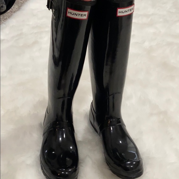 black shiny rain boots